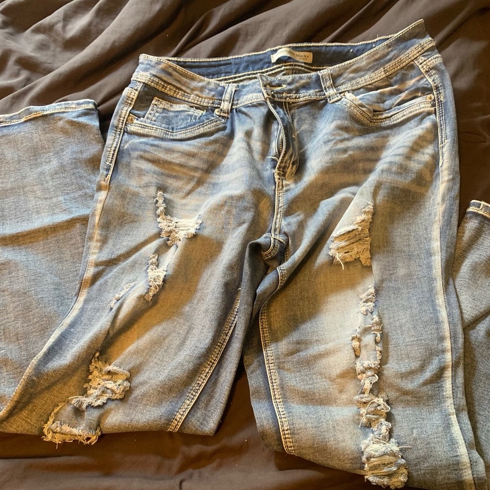 Boot cut distressed jeans